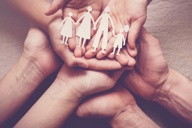 adult children hands holding paper family cutout family home 49149 814