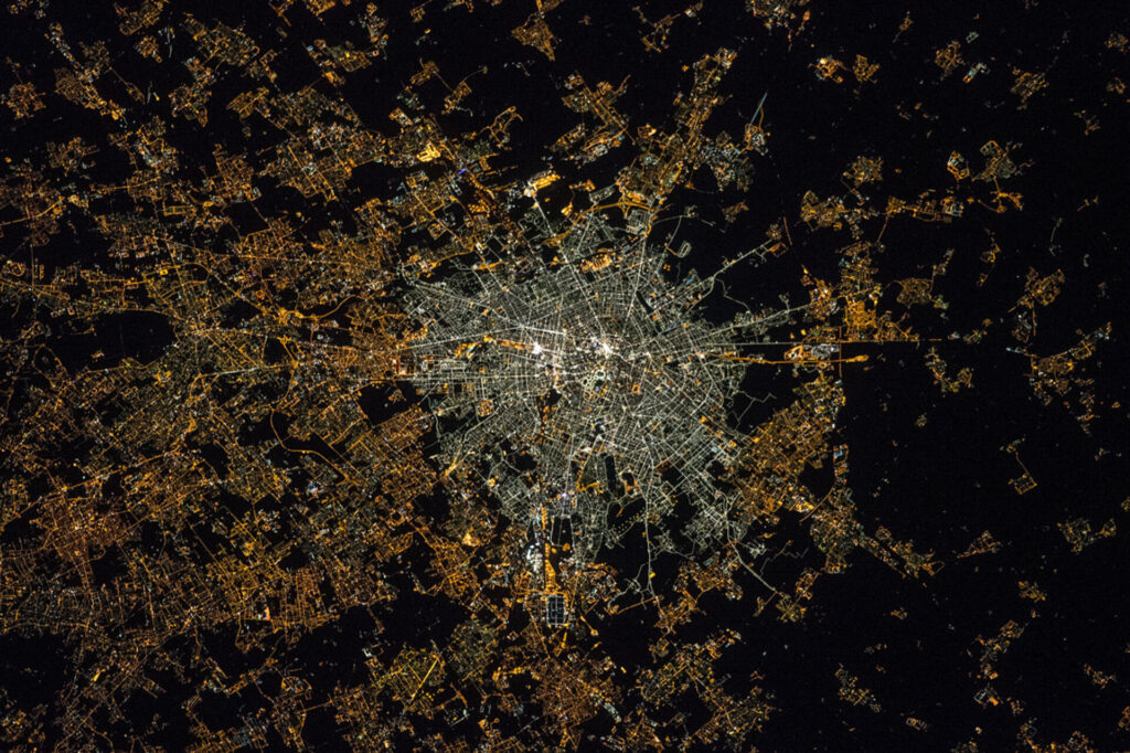 Milan at night in 2015 pillars