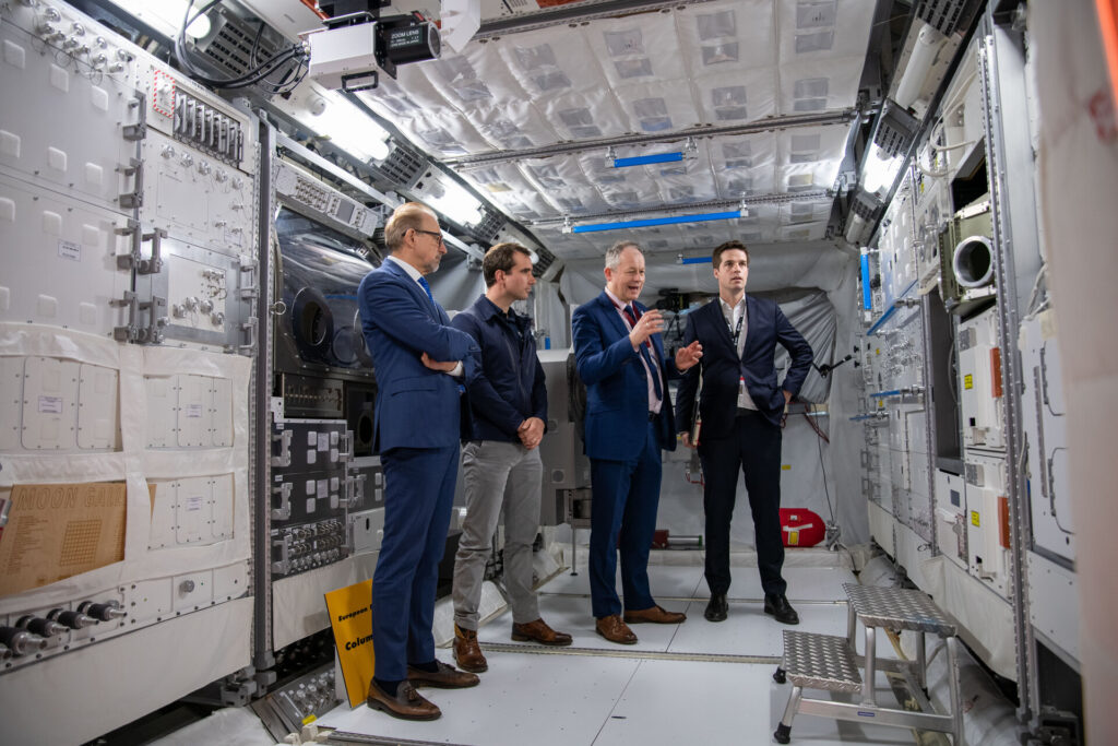 Inspecting replica of Europe s Columbus module pillars
