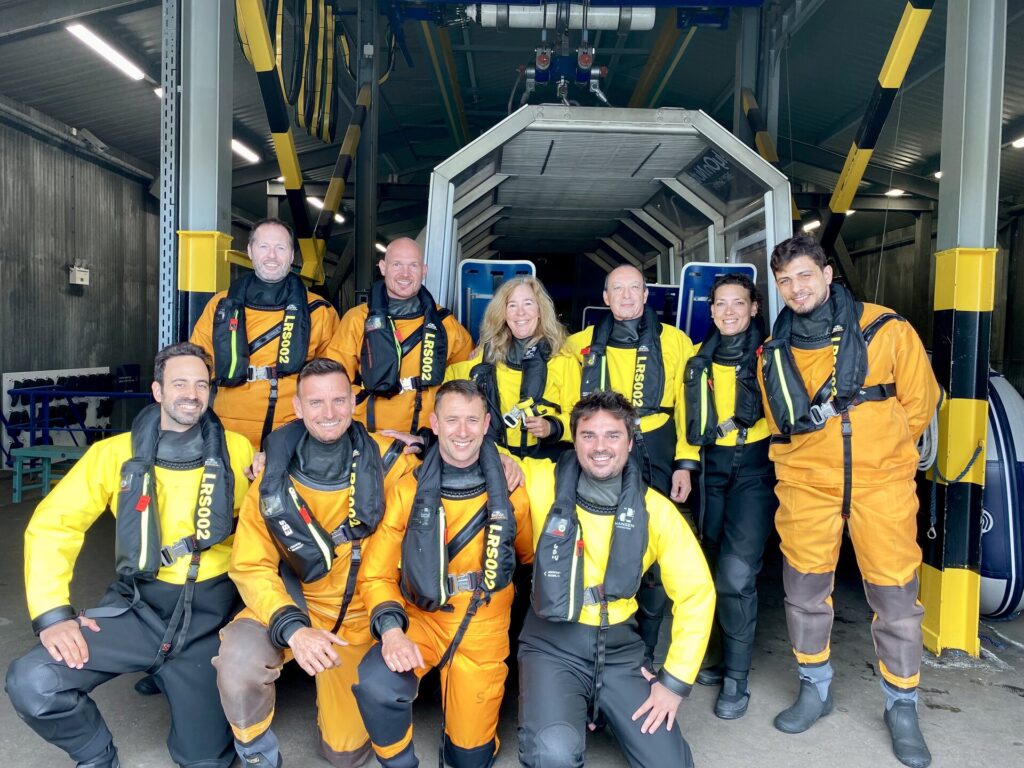 ESA participants of the helicopter underwater escape training pillars